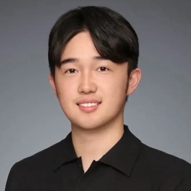 Henry's Y Combinator profile photo: slim, fresh haircut